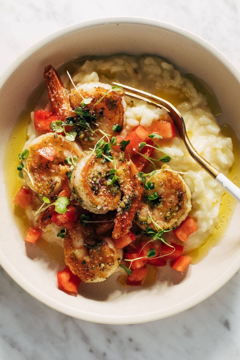 Pesto shrimp in a bowl with risotto.